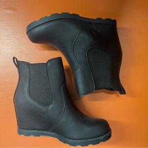Black wedge booties